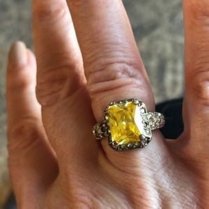 Ring with yellow stone